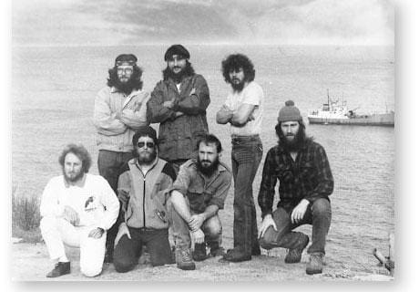GOUGH 36 (1992-1993): Back (L-R) R. Wilson (Meteorologist), A. Moolman (Radio Technician), P. Reichert (Diesel Mechanic); Front: K. Levey (Senior Meteorologist), W. Stockton (Radio Operator), H. Moller (Medic), S. Worth (Meteorologist).