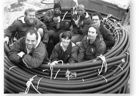 GOUGH 45 (1999-2000): Back (L-R) Beneke de Wet (Radio Technician), Peter Lekalakala (Meteorologist), Christine Haenel (Field Assistant), Victor Mafata (Meteorologist), Alex Jones (Field Assistant); Front: Kobus Steyn (Senior Meteorologist/Deputy Leader), Antwa Lombard (Medic/Leader), Aldo Strumpher (Diesel Mechanic).