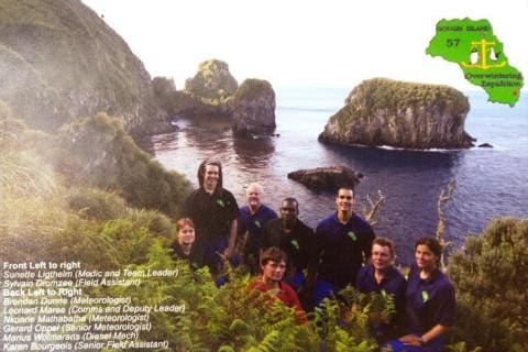 GOUGH 57 (2011-2012): Front (L-R) Sunette Ligtheim (Medic/Team Leader), Sylvain Dromzee (Field Assistant); Back L-R: Brendan Dunne (Meteorologist), Leonard Maree (Communications Officer/Deputy Leader), Nkoane Mathabatha (Meteorologist), Gerard Oppel (Senior Meteorologist), Marius Wolmarans (Diesel Mechanic), Karin Bourgeois (Senior Field Assistant).