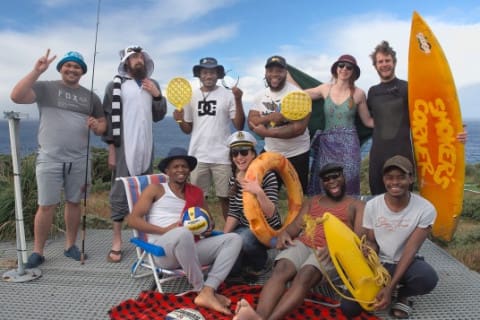 GOUGH 67 (2021-2022): Back (L-R): Selvin van Wyk (Diesel Mechanic), James Burns (Assistant Meteorological Technician), Nkosi Madama (Electrician), Karabo Mokwena (Senior Meteorological Technician), Kim Stevens (RSBP Senior Field Assistant), Roelf Daling (RSBP Field Assistant and Technician); (front) Sandile Nkebe (Medical Orderly and Team Leader), Vonica Perold (RSBP Field Assistant), Peter Chuku (Communications Engineer and Deputy Team Leader) and Tshililo Kharivha (Assistant Meteorological Technician).