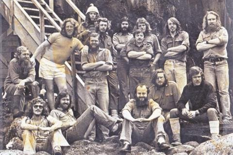 MARION 34 (1977-1978): Back (L-R) H. Erasmus (Mammal Biologist), P. Schoeman (Meteorologist), V. Trollip (Meteorologist), P. van Schalkwyk (Medic), D. van Coller (Biologist/Radio Operator), T. O\'Connor (Biologist), H. Lindeboom (Biologist), D. Langley (Geomorphologist) Middle: G. Luden (Deputy Leader/Senior Meteorologist), K. Hall (Geomorphologist), C. Erasmus (Ionosphericist/geomagnetisist), C. Grové (Leader/Meteorologist), R. Pettigrew (Diesel Mechanic).