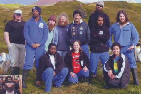 MARION 60 (2003-2004): Back (L-R) Shaun Miles (Medic), Ephaparus Mamabolo (Meteorologist), Greg Hofmeyr (Sealer & Conservation Officer), Leonard Maree (Radio Tech), Nole Green (Diesel Mechanic & Team Leader), Segale Motseto (Senior Meteorologist)(August 2003-April 2004), Bantu Hanise (Birder), Nico de Bruyn (Birder); Front: Fhatuwani Munyai (Sealer), Erika Nortje (Field Assistant Entomology & Deputy Leader), Sam Linnerts (Meteorologist); Insert: Shorty Terblancé (Senior Meteorologist)(April 2003 - August 2004).