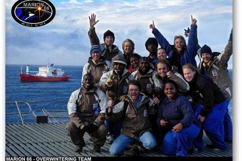 MARION 66  (2009-2010): Back (L-R) Ben Dilley (Birder), James Wilshire (Entomologist), Nandaadzishumi Nefehere (Sealer), Derek van der Merwe (Sealer), Johan Hoffman (Radio Technician/Deputy Leader); Middle Back: Delia Davies (Birder), Asanda Phiri (Entomologist); Marlene van Onselen (Birder); Middle Front: Kholekile Cita (Medic/Leader), Mpho Koalepe (Meteorologist), Martin Postma (Sealer), Mia Wege (Sealer); Front: Nkoane Mathabatha (Meteorologist), Mark White (Diesel Mechanic), Dianah Mabizela (Senior Meteorologist).