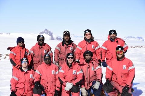 SANAE 57 (2018): Back (L-R) Elias Seabi (Senior Meteorological Technician), Lux Tanyana (Base Engineer), Sabelo Biyela (Diesel Mechanic), Cobus van der Merwe (Neutron Engineer), Hloni Rakoteli (Radio Technician); (front) Stephanus Schoeman (SANSA RADAR Engineer), Foster Mashele (SANSA VLF Engineer), Will Jelbert (Medical Doctor and Team Leader), John Skelete (Diesel Mechanic), Bo Orton (Electrician).